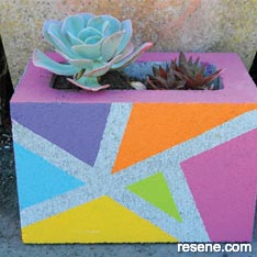 Paint an abstract pattern on your planter