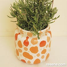 Paint an abstract pattern on a glass jar to make a room lavender freshner