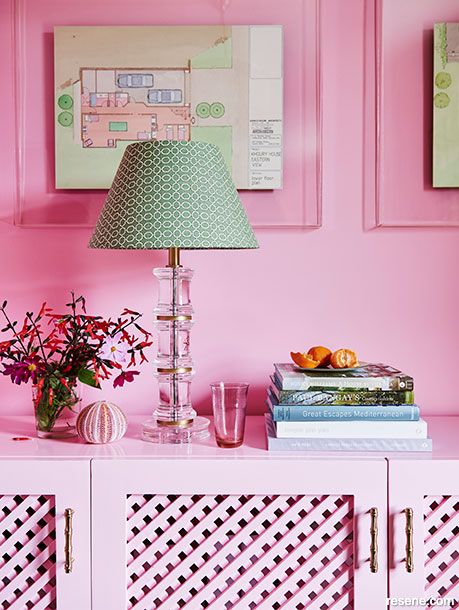 A pink colour-drenched interior