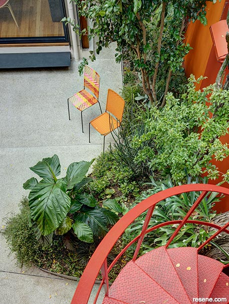 The terrace house and garden were designed with a unified colour story