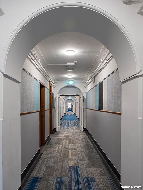 Corridors transformed by paint colours, carpeting, pinboards and lighting