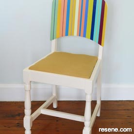 Paint a stripes on a wooden chair