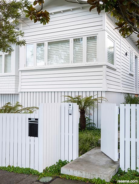 A classic white bungalow exterior