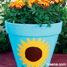Paint a sunflower inspired pot 